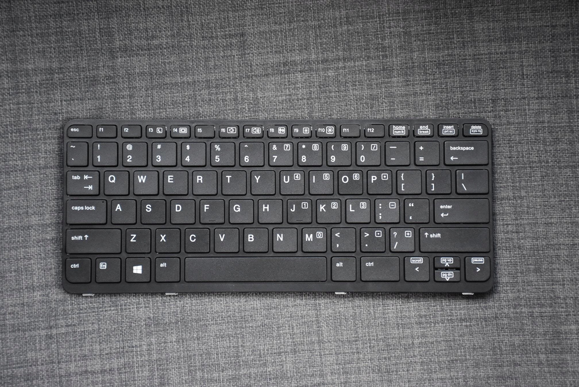 Nowa Klawiatura do HP 720 725 810 820 G1 G2 2 Czarna klawiatura do laptopa HP ułożona na szarym materiale